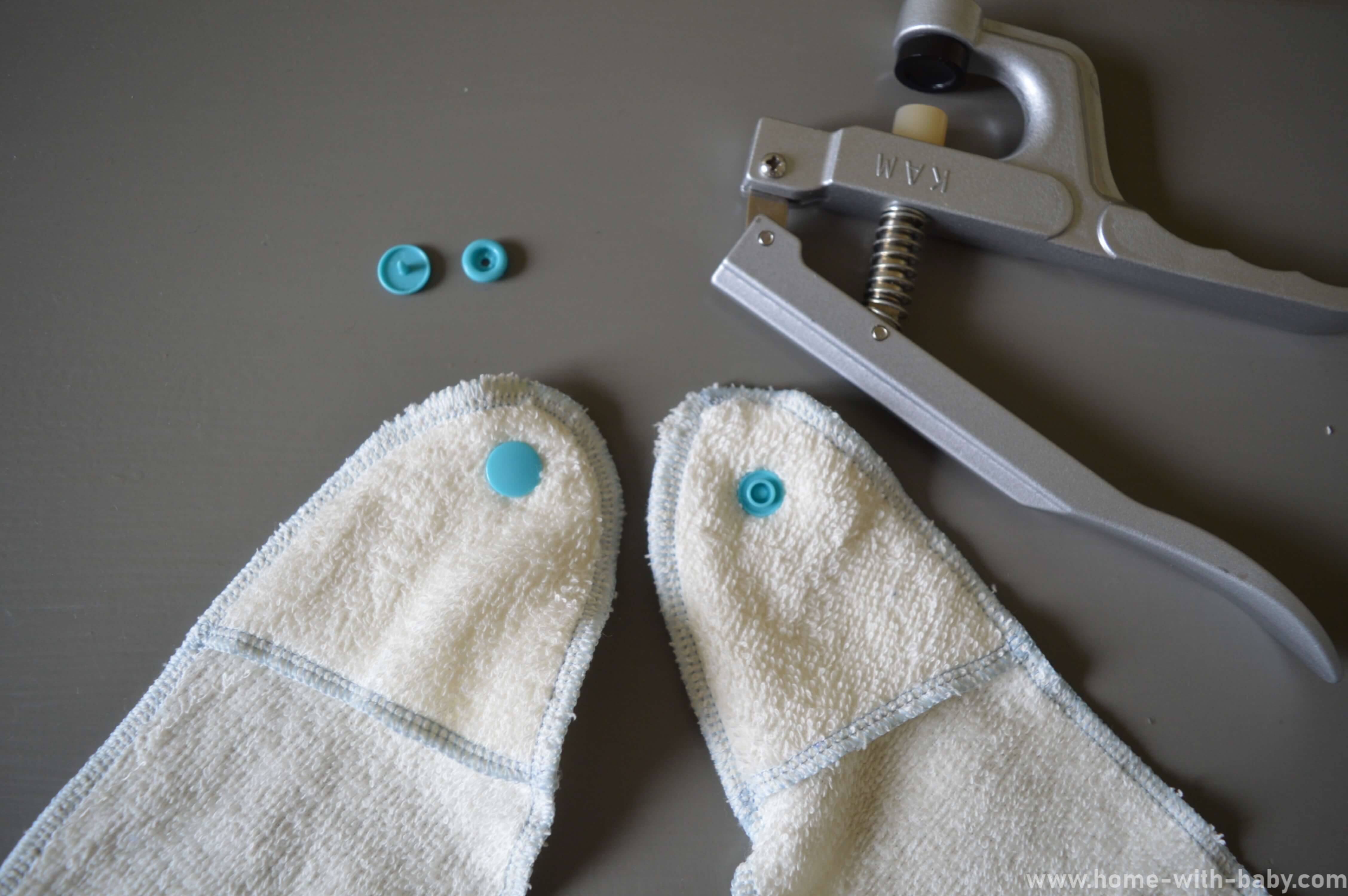 Baby towel with snaps attached Baby towel with snaps attached