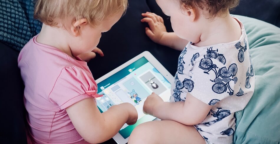 Screen time for baby: two babies looking at tablet screen