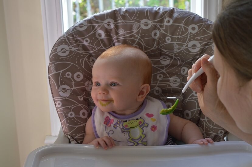 Baby turning away from spoon Baby turning away from spoon